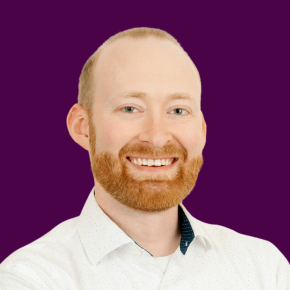 Headshot of Griffin Smith over a plum-colored background