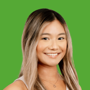 Headshot of Kathy Thin over a grass-colored background