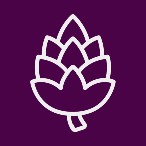 Icon of an acorn on a plum colored background