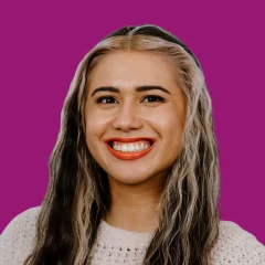 Headshot of Karalyn Jenkins over a ube-colored background