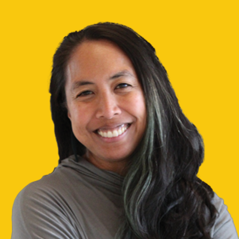 Headshot of Abby Sarmac over a dandelion colored background