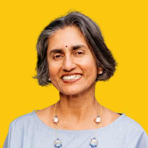 Lalitha Vaidyanathan headshot over a dandelion colored background