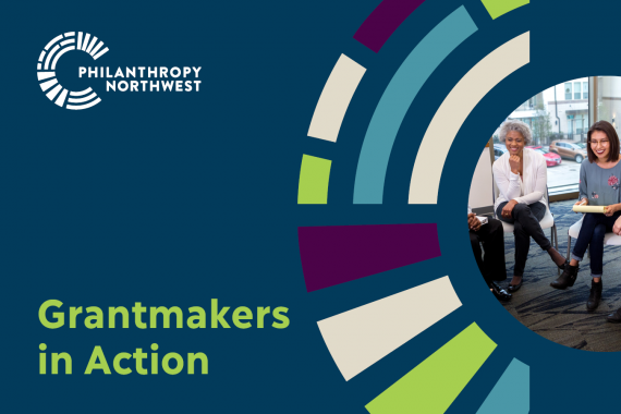 Denim blue event banner that says "Grantmakers in Action" and has a colorful half circle design on the side with a photo of two women sitting in a group circle, smiling.