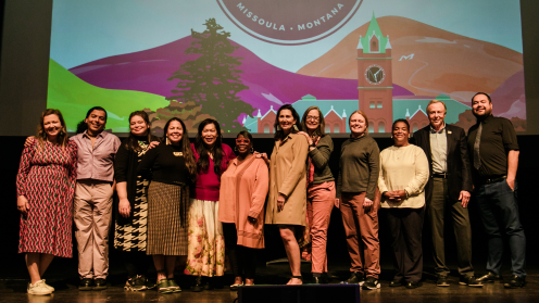 A photo of Philanthropy Northwest board members on stage at our PNW24 Conference reception in Missoula, Montana.