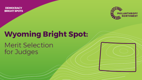 Graphic titled “Wyoming Bright Spot: Merit Selection for Judges,” with a plum “Democracy Bright Spots” header, the Philanthropy Northwest logo in the top right, and an outline of Wyoming over a grass-to-lime gradient background with contour lines.
