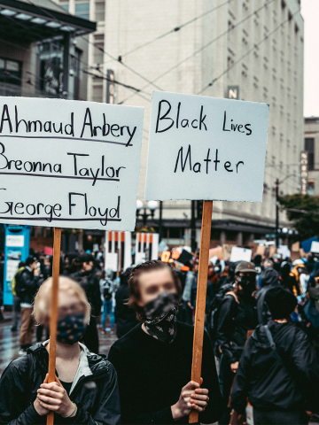 Protesters in Seattle with Black Lives Matter signs