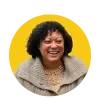 Headshot of Dawn Chirwa over a dandelion colored background
