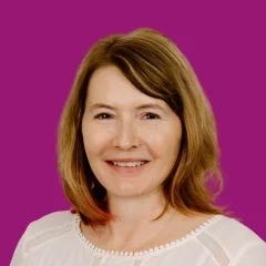 Headshot of Karen Westing over a ube-colored background